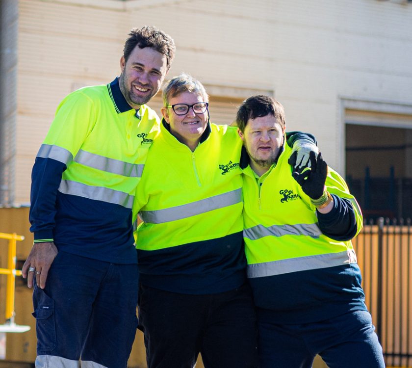 Good Sammy Enterprises employees smiling at camera